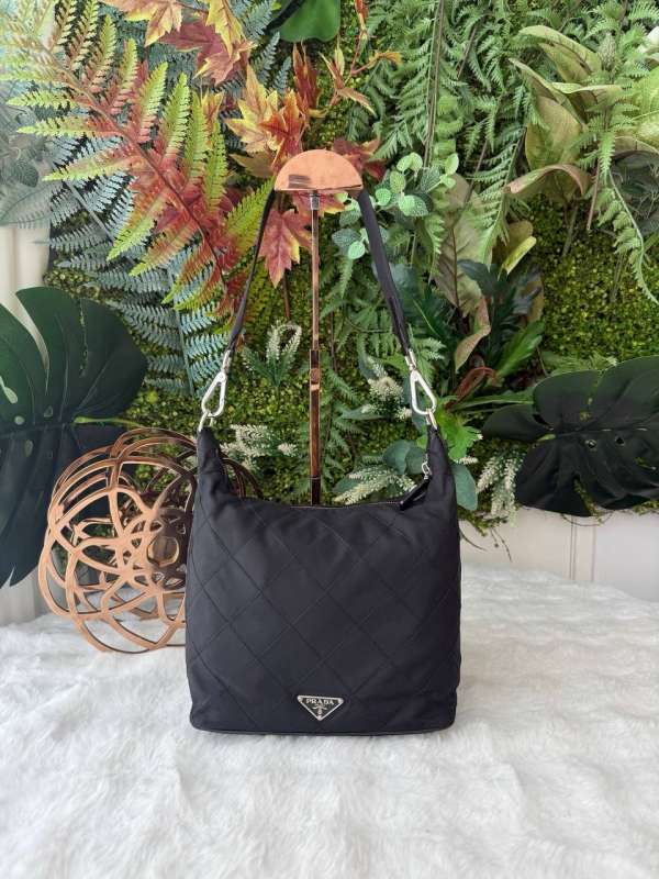 Prada enameled metal triangle